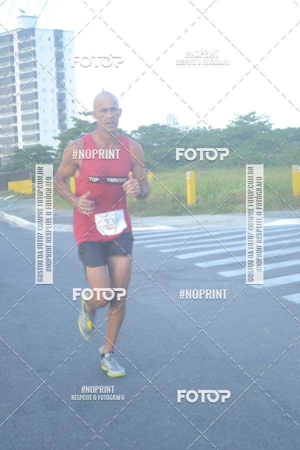 Buy your photos of the eventguia 13K Praia Grande on Fotop