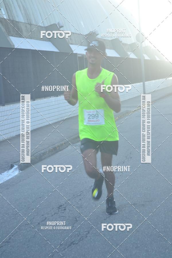 Buy your photos of the eventguia 13K Praia Grande on Fotop