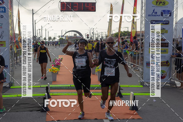 Buy your photos of the eventguia 13K Praia Grande on Fotop