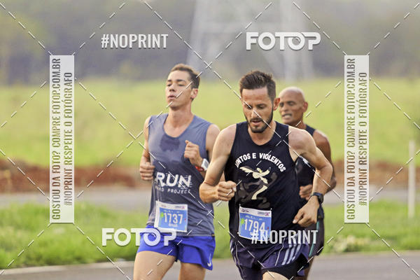 Buy your photos of the event4� Ua�a� Night Run on Fotop