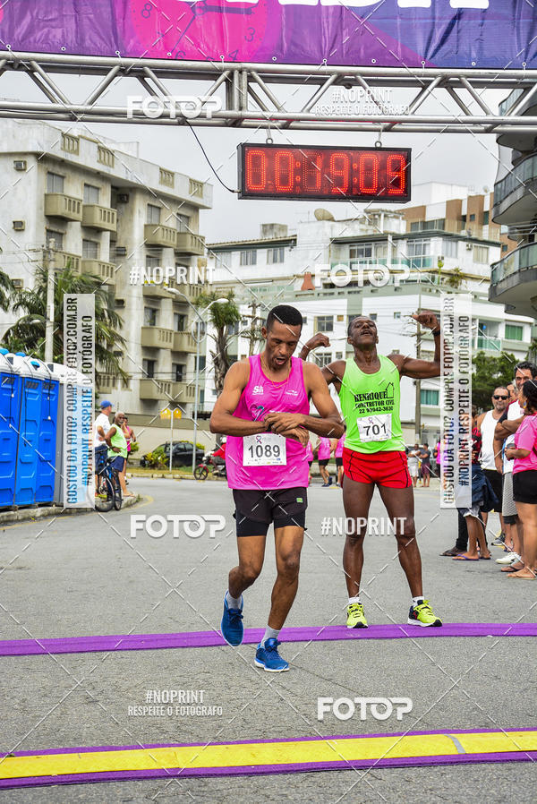 Buy your photos of the eventCorrida e Caminhada Outubro Rosa e Novembro Azul on Fotop