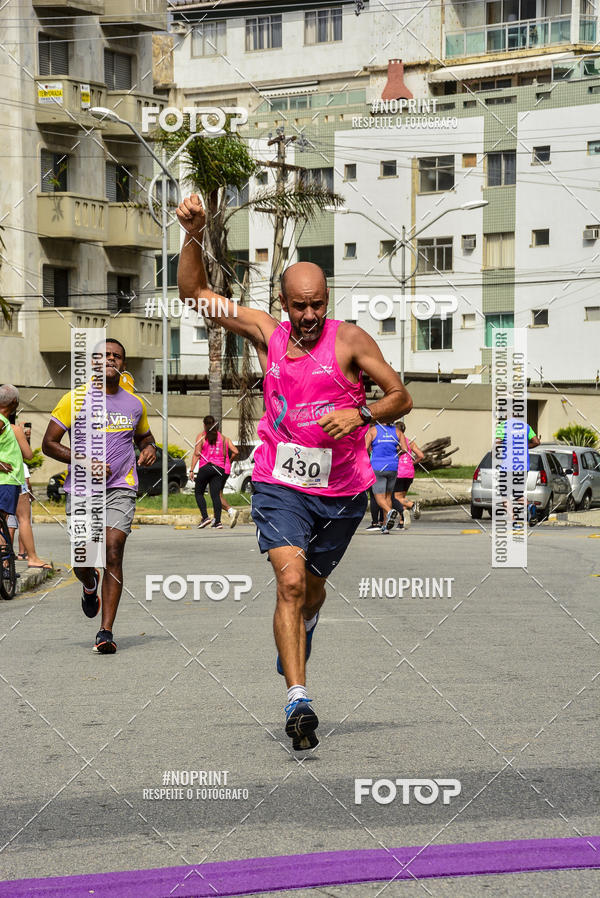 Buy your photos of the eventCorrida e Caminhada Outubro Rosa e Novembro Azul on Fotop
