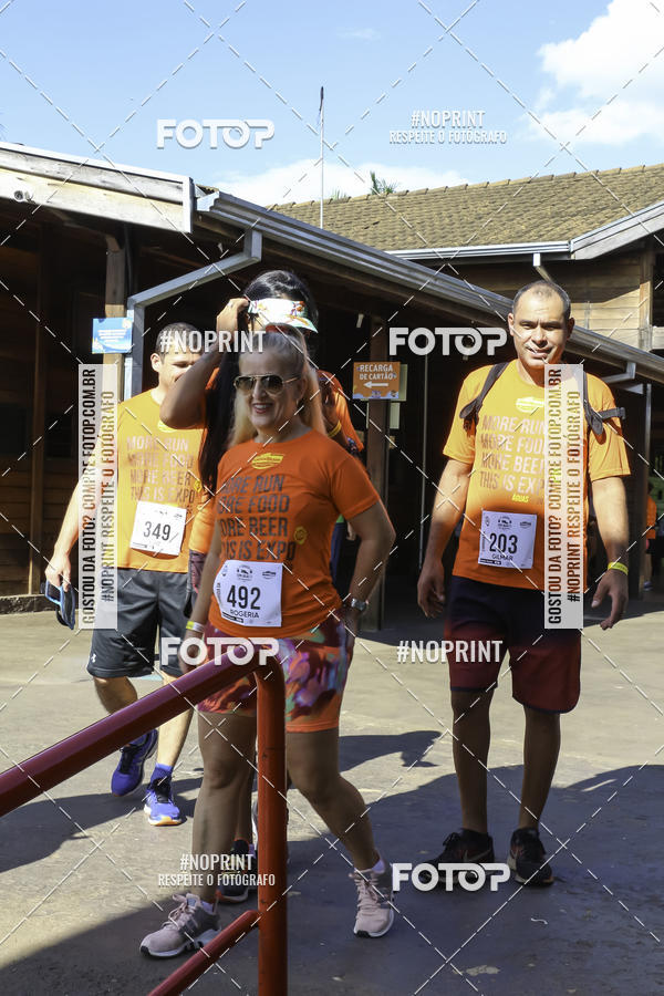 Buy your photos of the event1 Beer Run Expo guas on Fotop