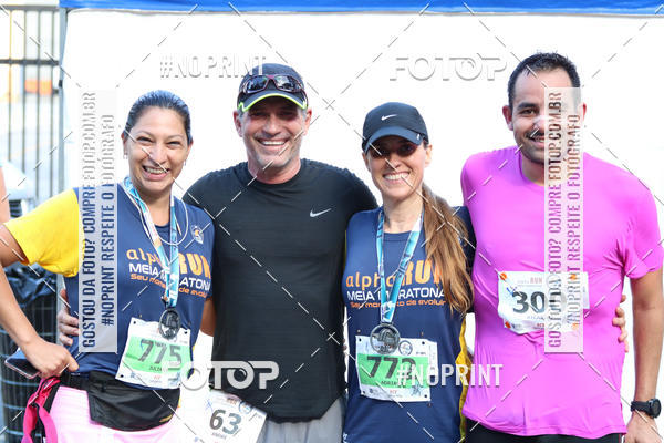 Buy your photos of the event21K Alpha Run - Equipe ASI on Fotop