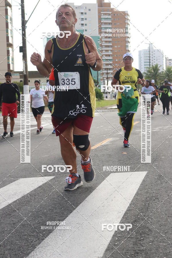 Compre suas fotos do evento8 Km Vero PRAIA GRANDE no Fotop