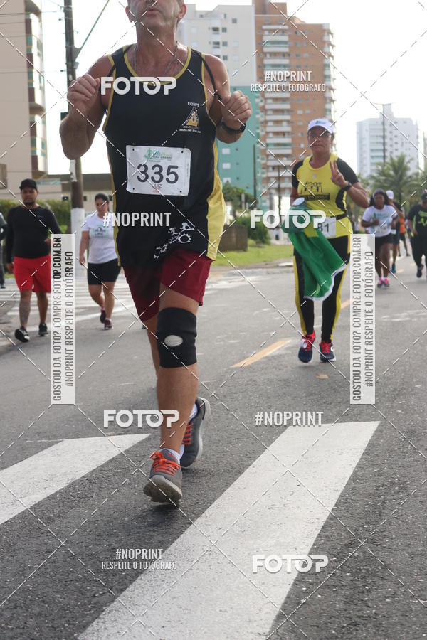 Compre suas fotos do evento8 Km Vero PRAIA GRANDE no Fotop