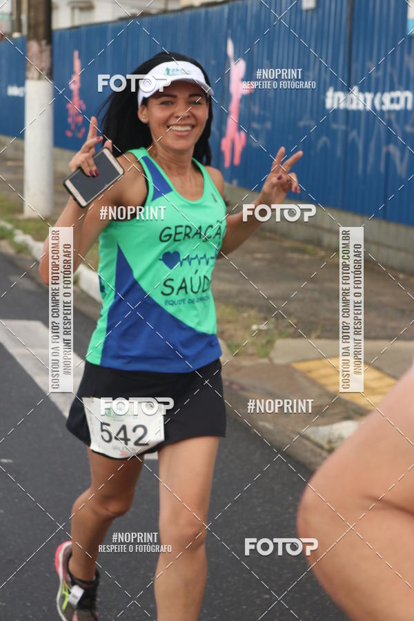 Compre suas fotos do evento8 Km Vero PRAIA GRANDE no Fotop