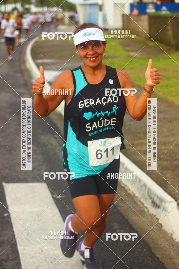 Compre suas fotos do evento8 Km Vero PRAIA GRANDE no Fotop