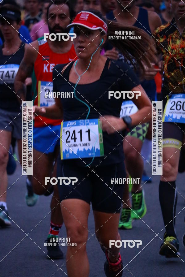 Buy your photos of the eventASICS Golden Run SP 2019 on Fotop