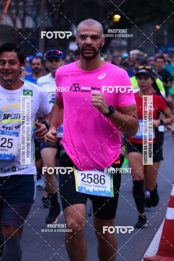 Buy your photos of the eventASICS Golden Run SP 2019 on Fotop