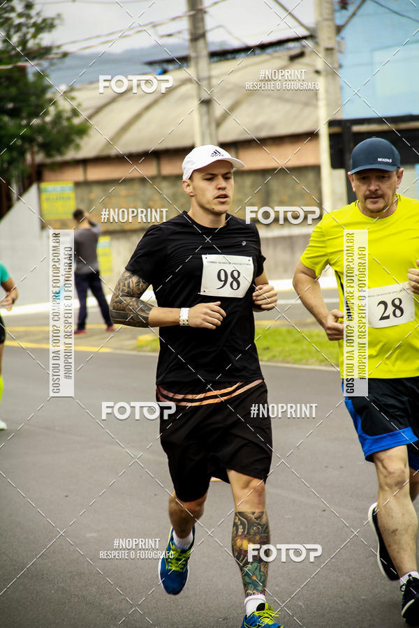 Compra tus fotos del eventoCorrida de Rua P.U.V.A En Fotop