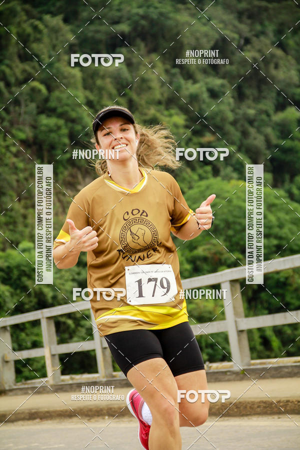 Compra tus fotos del eventoCorrida de Rua P.U.V.A En Fotop