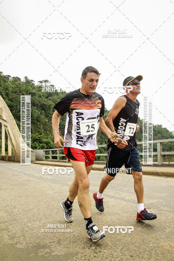 Compra tus fotos del eventoCorrida de Rua P.U.V.A En Fotop