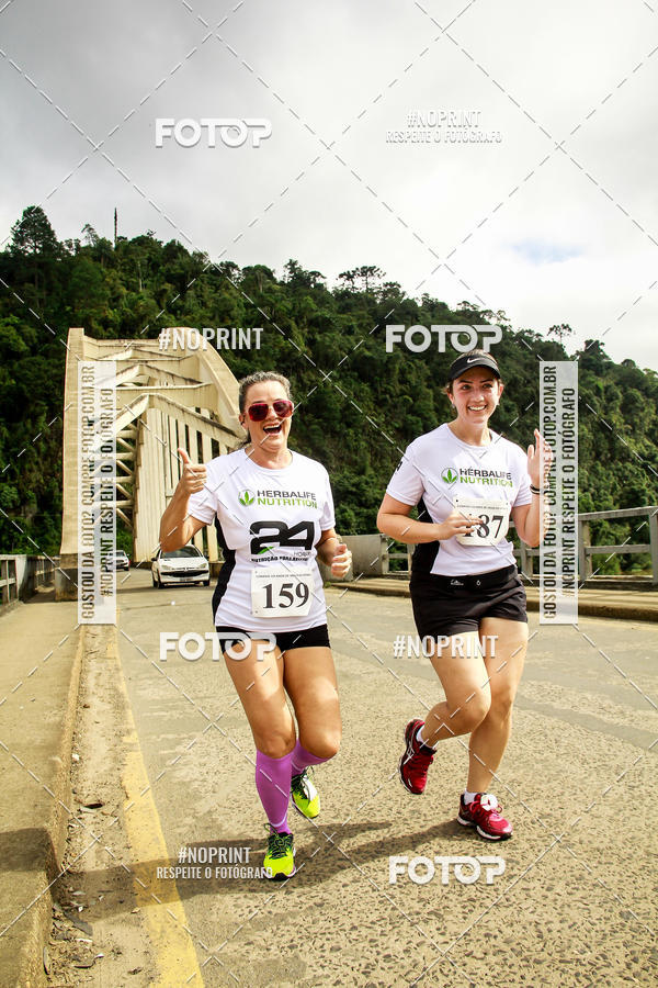 Compra tus fotos del eventoCorrida de Rua P.U.V.A En Fotop