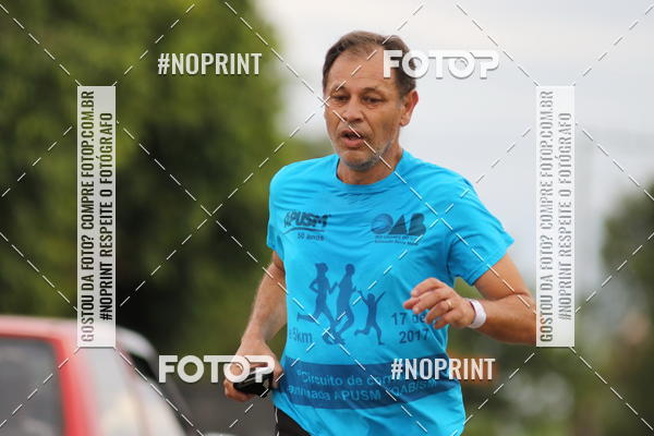 Buy your photos of the eventCorrida de Pscoa Santa Maria on Fotop