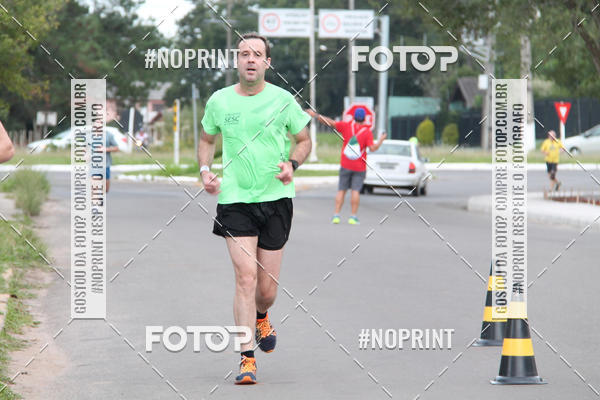 Buy your photos of the eventCorrida de Pscoa Santa Maria on Fotop