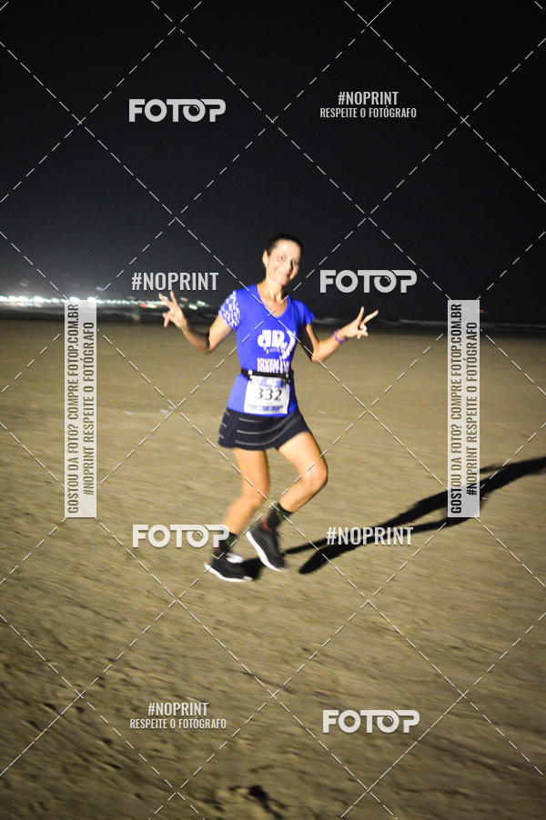 Buy your photos of the eventJovem Pan Night Run Santos on Fotop