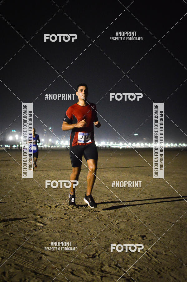 Buy your photos of the eventJovem Pan Night Run Santos on Fotop