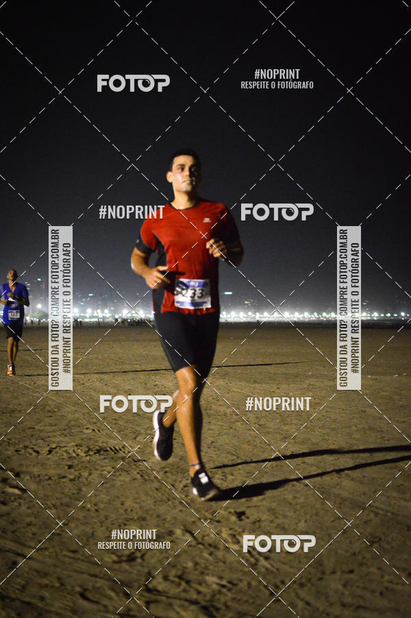 Buy your photos of the eventJovem Pan Night Run Santos on Fotop