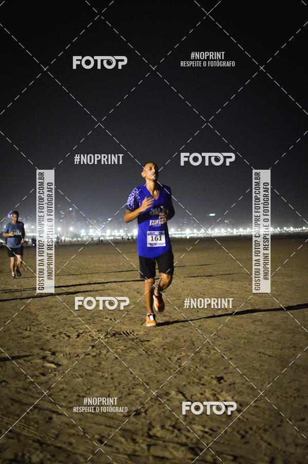 Buy your photos of the eventJovem Pan Night Run Santos on Fotop