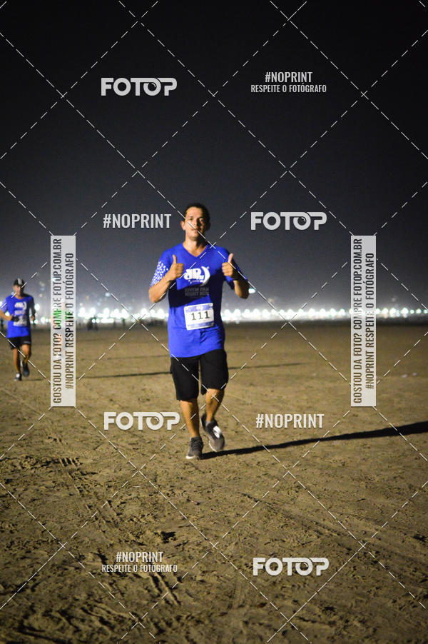 Buy your photos of the eventJovem Pan Night Run Santos on Fotop