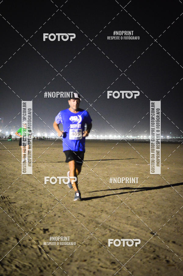 Buy your photos of the eventJovem Pan Night Run Santos on Fotop