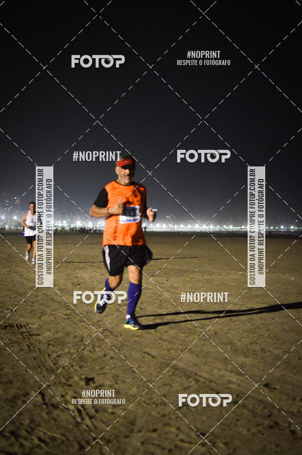 Buy your photos of the eventJovem Pan Night Run Santos on Fotop
