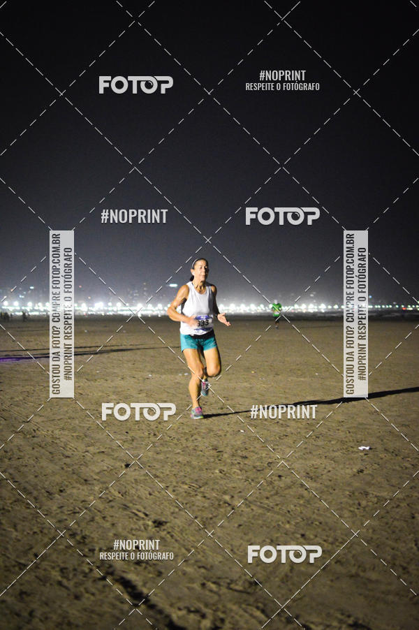 Buy your photos of the eventJovem Pan Night Run Santos on Fotop