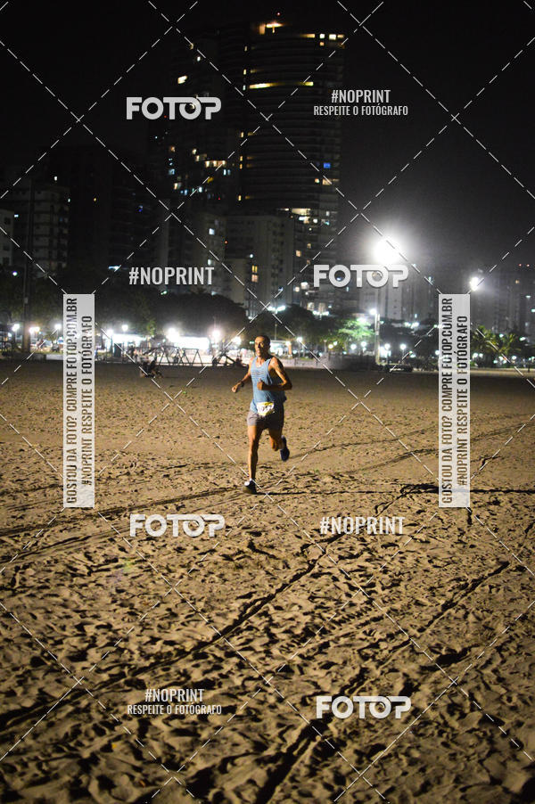 Buy your photos of the eventJovem Pan Night Run Santos on Fotop