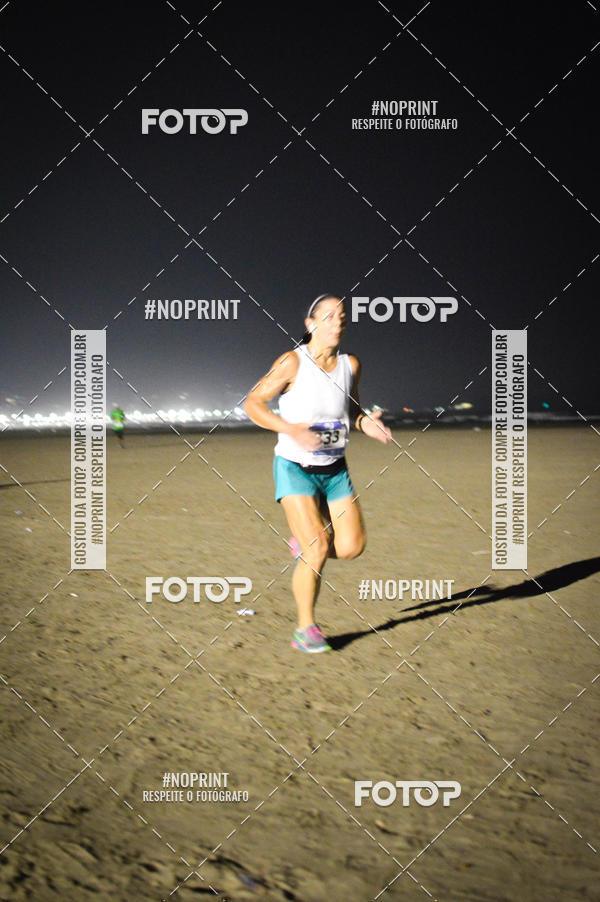 Buy your photos of the eventJovem Pan Night Run Santos on Fotop