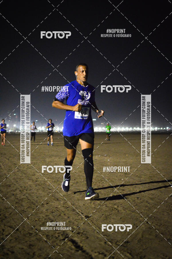 Buy your photos of the eventJovem Pan Night Run Santos on Fotop