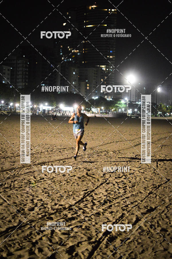 Buy your photos of the eventJovem Pan Night Run Santos on Fotop