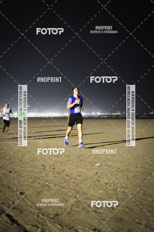 Buy your photos of the eventJovem Pan Night Run Santos on Fotop