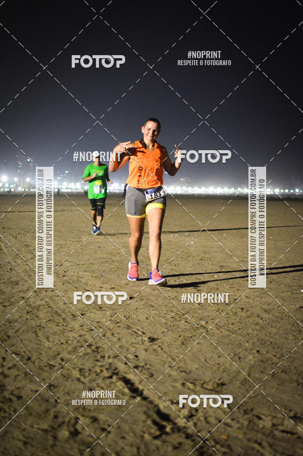 Buy your photos of the eventJovem Pan Night Run Santos on Fotop