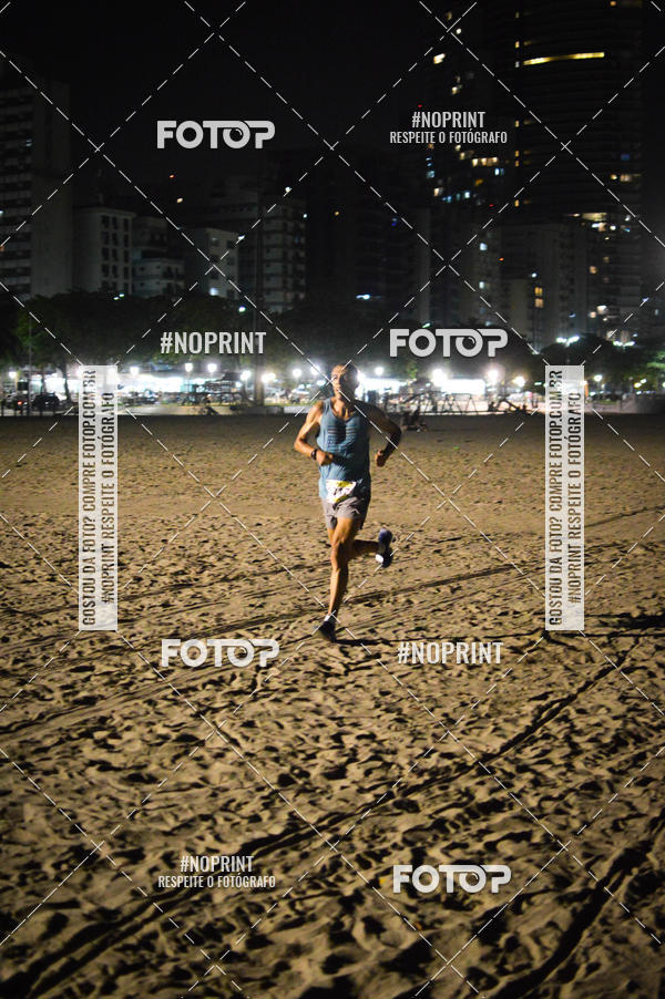 Buy your photos of the eventJovem Pan Night Run Santos on Fotop