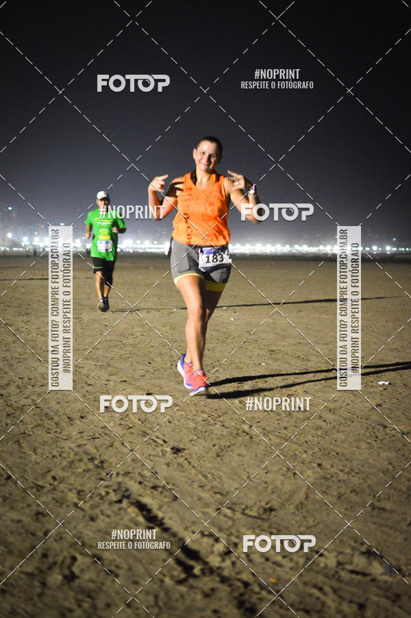Buy your photos of the eventJovem Pan Night Run Santos on Fotop