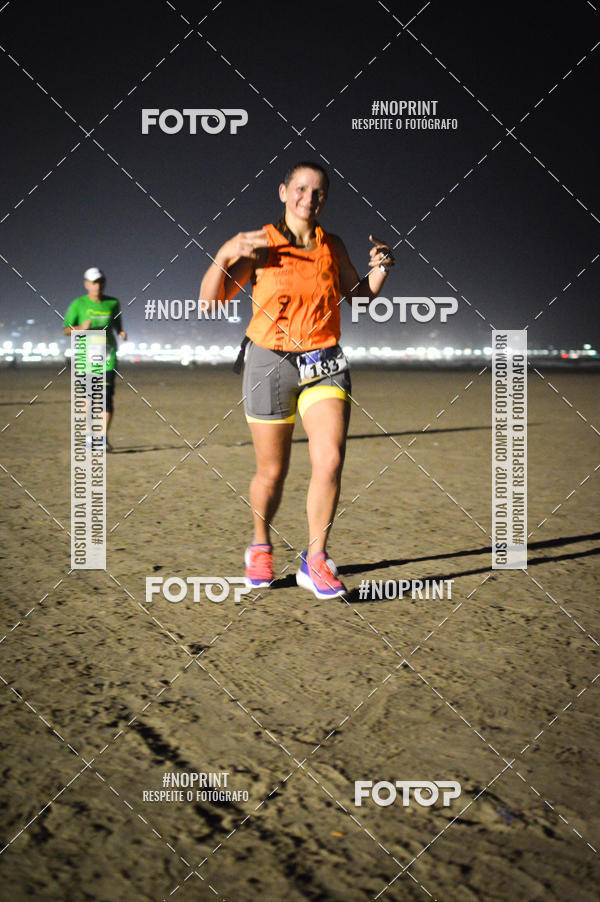 Buy your photos of the eventJovem Pan Night Run Santos on Fotop