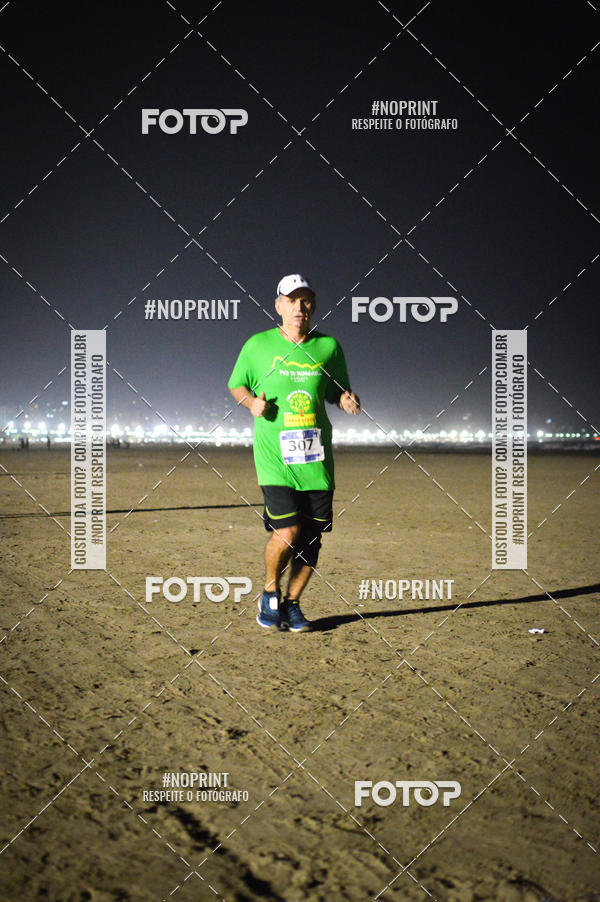 Buy your photos of the eventJovem Pan Night Run Santos on Fotop