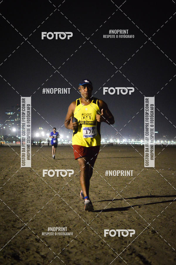Buy your photos of the eventJovem Pan Night Run Santos on Fotop