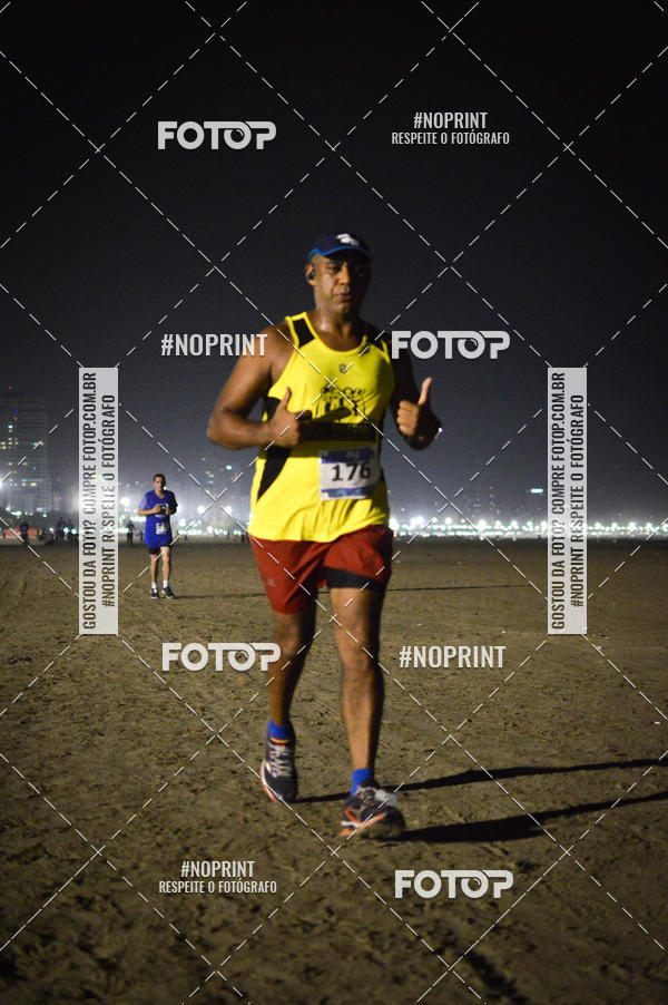 Buy your photos of the eventJovem Pan Night Run Santos on Fotop