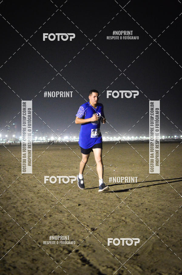 Buy your photos of the eventJovem Pan Night Run Santos on Fotop