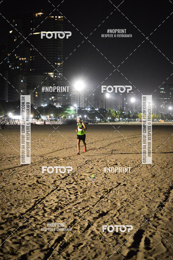Buy your photos of the eventJovem Pan Night Run Santos on Fotop