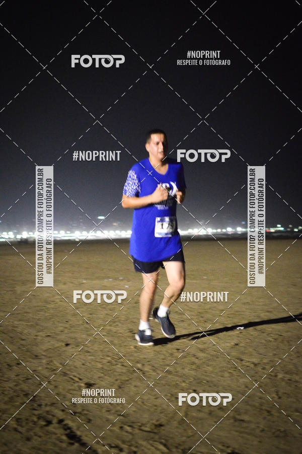 Buy your photos of the eventJovem Pan Night Run Santos on Fotop