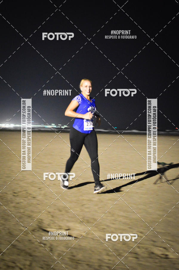 Buy your photos of the eventJovem Pan Night Run Santos on Fotop