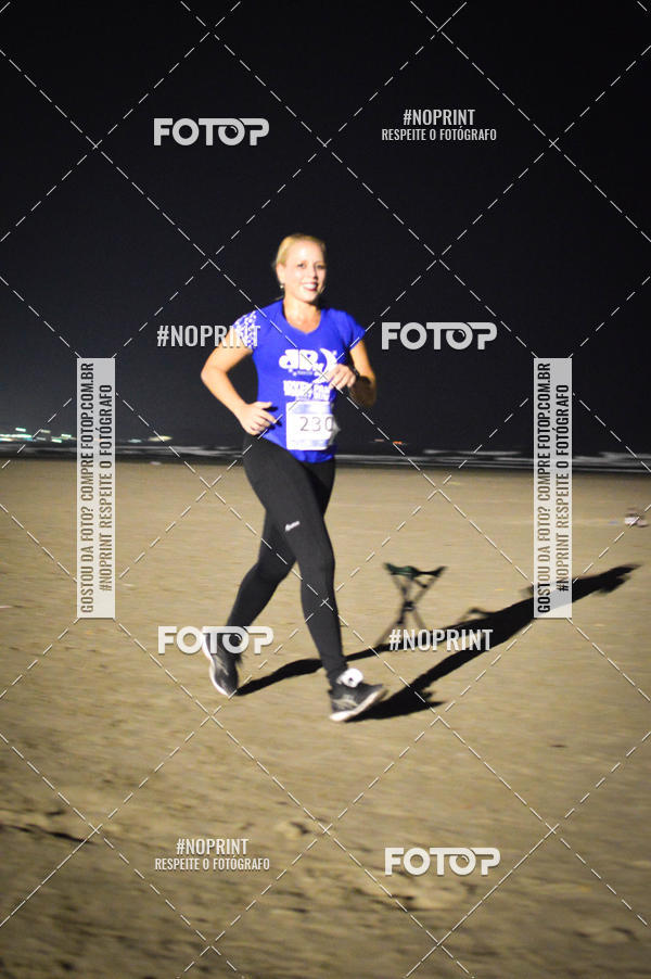 Buy your photos of the eventJovem Pan Night Run Santos on Fotop