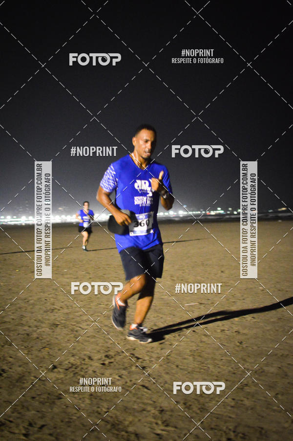 Buy your photos of the eventJovem Pan Night Run Santos on Fotop