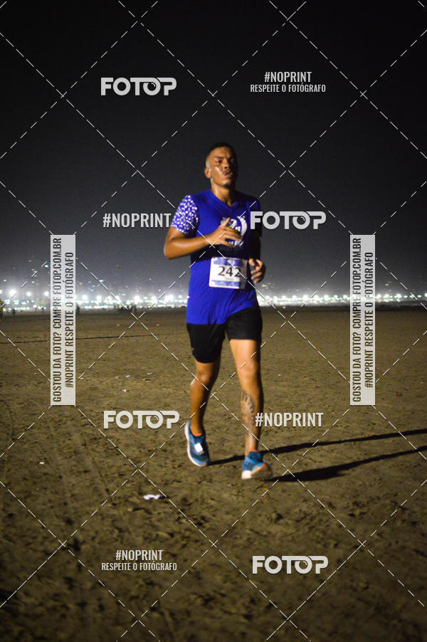 Buy your photos of the eventJovem Pan Night Run Santos on Fotop