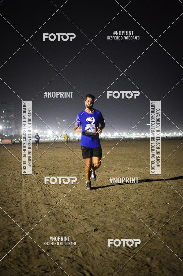 Buy your photos of the eventJovem Pan Night Run Santos on Fotop