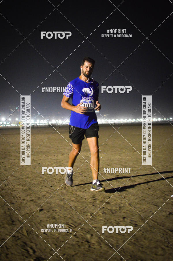 Buy your photos of the eventJovem Pan Night Run Santos on Fotop