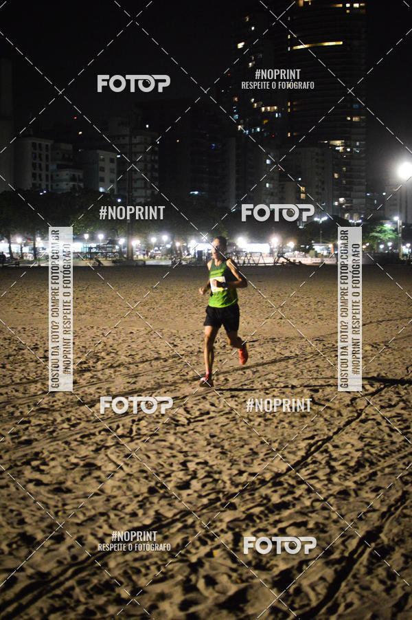 Buy your photos of the eventJovem Pan Night Run Santos on Fotop